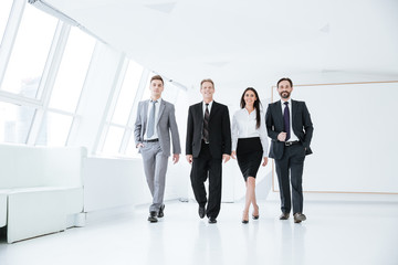 Fototapeta premium Full length Business team walk in office
