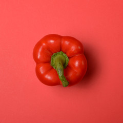 Fresh red paprika on red backround - Top view