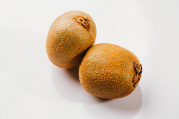 some kiwi fruit on a light background close-up