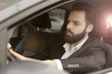 Bearded man driving
