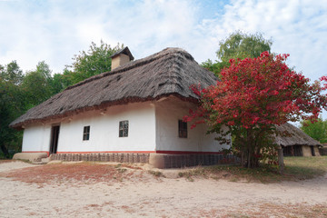 Fototapeta na wymiar Old house of peasants in the museum Pirogovo. Ukraine