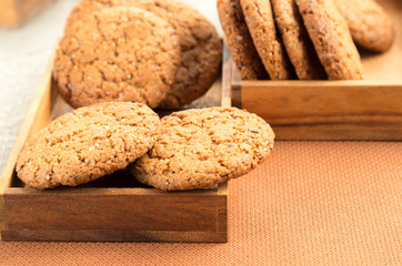 Close-up view on oat biscuits in wooden boxes