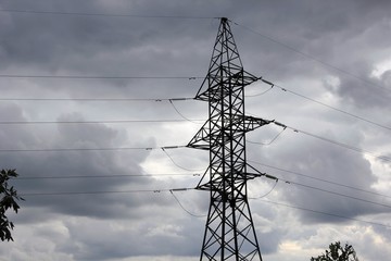 reliance power lines against a stormy sky