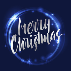 Merry Christmas lettering. Modern hand lettering on a blue backg