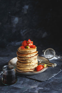 Stack of Gluten free Oat Flour Pancakes served with chopped Stra
