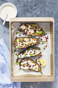 Roasted Aubergine / eggplant with Tahini Dressing, pomegranate a