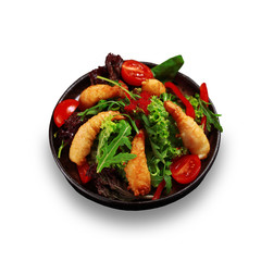 Seychelles cuisine. Salad with tempura shrimp isolated.