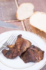 Fried pork liver served on the plate