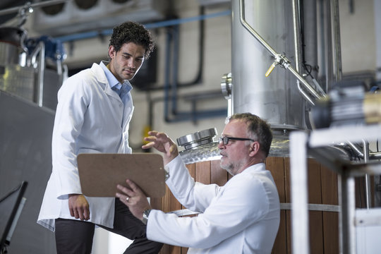 People working in distillery