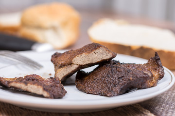 Selective focus on fried pork liver