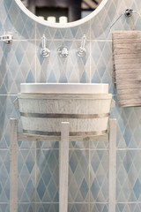 vintage white washbasin with wooden stand