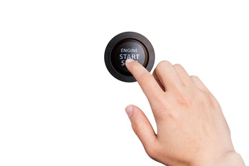 Close up of finger pressing the start/stop engine button on a ca