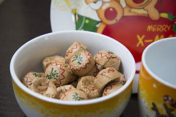 Christmas set of dishes. Lies in a Cup of tea.