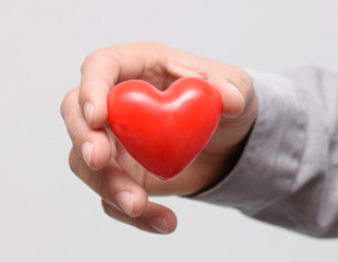 Fototapeta premium Red heart in hand