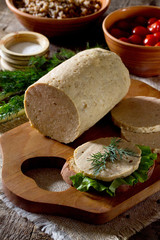 Sandwich with homemade dairy meat sausage and a variety of veget