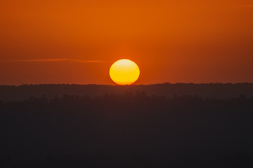 silhouette yellow sunset orange sky and moutain