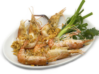 Prawn lobster or shrimp fried with garlic and vegetables.