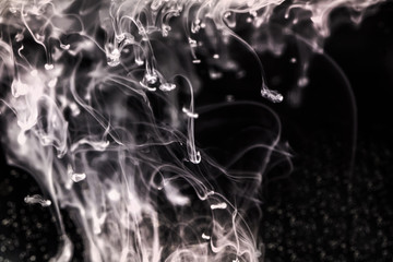 white smoke isolated on black background