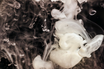 white smoke isolated on black background