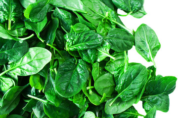 Fototapeta na wymiar Fresh Spinach leaves close up isolated on white background..