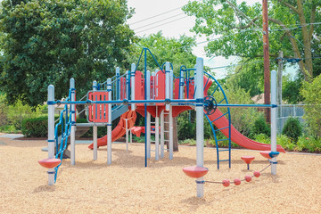 Fototapeta na wymiar Playground on yard in the park