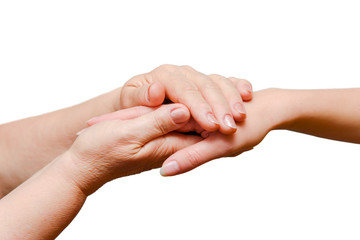 Adult hands hold a young hand.