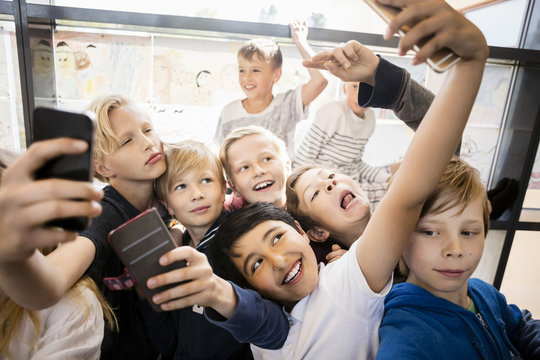 Boys  making selfie