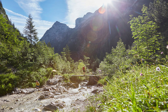 Mother and son exploring, H&iacute;_llental, Zugspitze, Garmisch-Partenkirchen, Bavaria, Germany