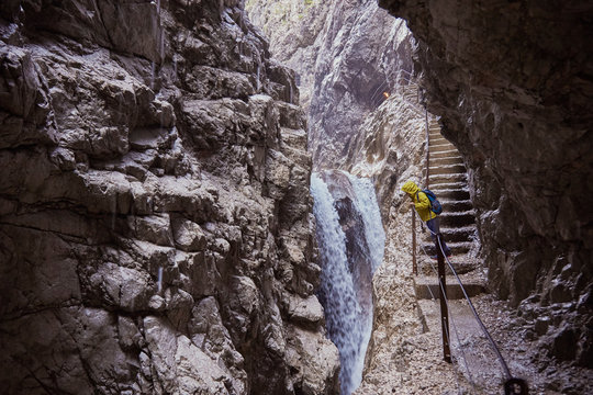 Young boy standing on stone steps, looking at view, H&iacute;_llental, Zugspitze, Garmisch-Partenkirchen, Bavaria, Germany