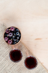 Homemade liqueur made from black currants and red gooseberry.