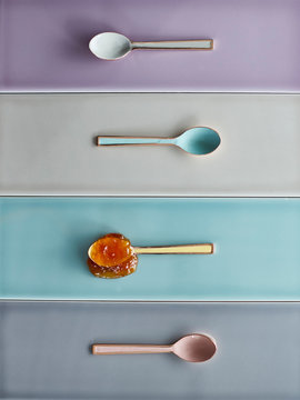 Spoons arranged on tiles