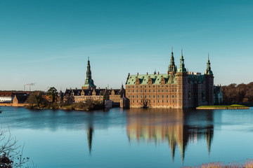 Frederiksborg castle reflecting in the lake