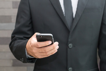Businessman using mobile smartphone