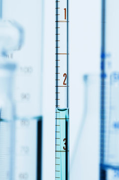 Meniscus. Curved surface (meniscus) of water in graduated pipette. Liquid volume measured by reading the scale at the bottom of the meniscus. The reading is 2.37 mL
