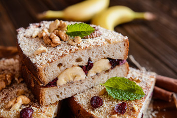 Banana toasts with walnut, cranberries and cinnamon