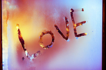 Fototapeta premium Love. The inscription on the sweaty glass. Declaration of love. Valentine's day.