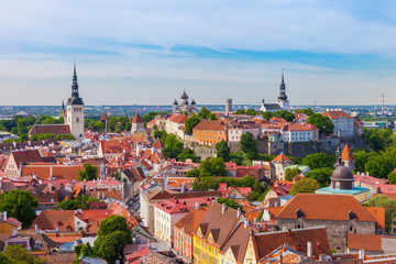 Fototapeta na wymiar View from tower of St Olaf Church of old Tallinn and roofs