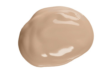 Round face make-up liquid foundation sample on a white background