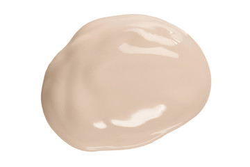 Round face make-up liquid foundation sample on a white background