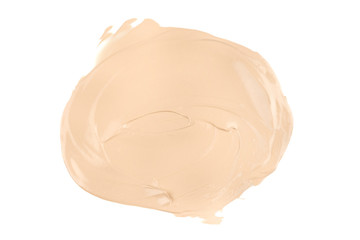 Round face make-up liquid foundation sample on a white background