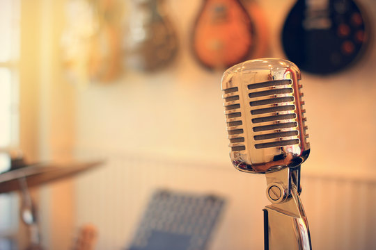 Vintage silver microphone image with warm filter 