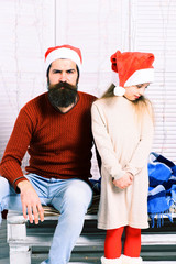 Fototapeta premium santa man with blonde girl