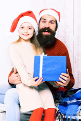 santa man with blonde girl