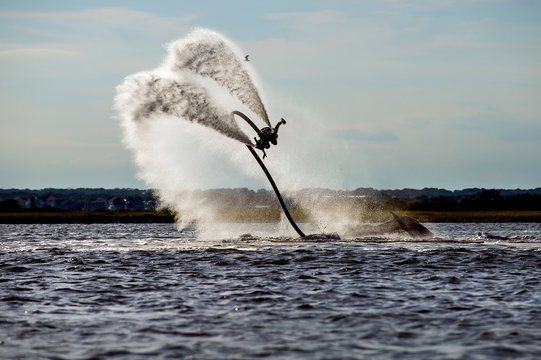Person flyboarding in ocean, Seaside Heights, New Jersey, USA
