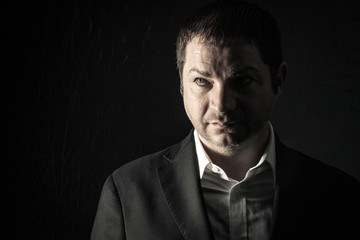 a dangerous man, a businessman will not allow themselves to be deceived, security, a strong man, a serious businessman, security service, respectable person, a man in a jacket,