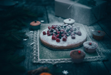 homemade christmas pie holiday dessert in new year tree decorations frame on vintage wooden table background