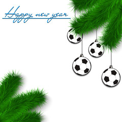 Soccer balls on Christmas tree branch