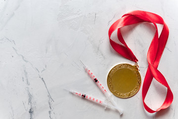 Concept of doping in sport - deprivation medals top view