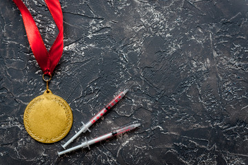 Concept of doping in sport - deprivation medals top view
