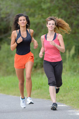 Two women jogging